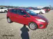 2012 Ford Fiesta SE with VIN 3FADP4EJ7CM173494, listed as a Copart auction lot 82229335 with 83,628 mi miles and Salvage title. Bid and sale history available at DreamBid. Image 4.