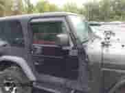 2004 Jeep Wrangler Sport z VIN 1J4FA49S34P706826, wystawiony jako IAAI lot #43262761 z przebiegiem 99 901 mil mil oraz . Historia ofert i sprzedaży dostępna na DreamBid. Obrazek 13.