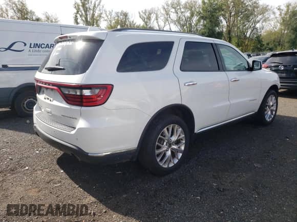 2014 Dodge Durango Citadel with VIN 1C4RDJEG7EC598004, listed as a Copart auction lot 82050895 with 251,987 mi miles and Salvage title. Bid and sale history available at DreamBid. Image 3.