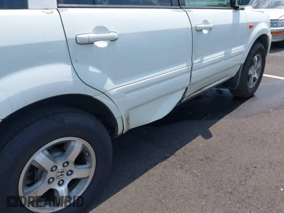 2006 Honda Pilot EX-L z VIN 5FNYF28576B002495, wystawiony jako IAAI lot #42926016 z przebiegiem 212 025 mil mil oraz . Historia ofert i sprzedaży dostępna na DreamBid. Obrazek 6.