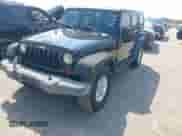 2008 Jeep Wrangler Unlimited X z VIN 1J4GA39148L612425, wystawiony jako IAAI lot #43266301 z przebiegiem 196 635 mil mil oraz . Historia ofert i sprzedaży dostępna na DreamBid. Obrazek 2.