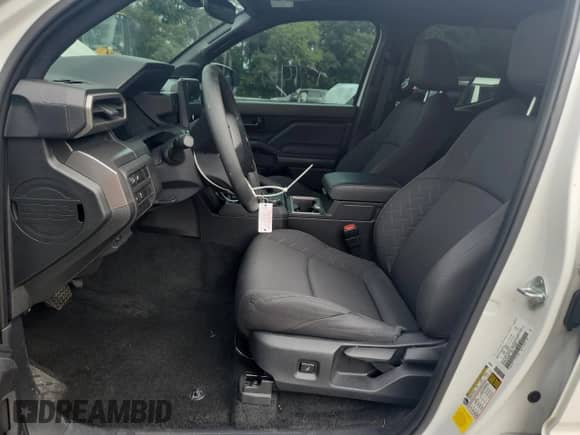 2024 Toyota Tacoma SR5 with VIN 3TYLB5JN2RT035281, listed as a Copart auction lot 69350095 with 9,907 mi miles and Salvage title. Bid and sale history available at DreamBid. Image 7.