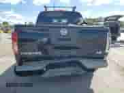 2006 Nissan Frontier SE with VIN 1N6AD07UX6C412495, listed as a Copart auction lot 84879235 with 257,704 mi miles and Salvage title. Bid and sale history available at DreamBid. Image 6.