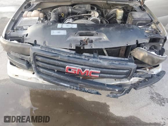 2002 GMC Sierra 1500 z VIN 1GTEC14W02Z254484, wystawiony jako Copart lot #68341995 z przebiegiem 212 814 mil mil oraz Szkoda całkowita • Salvage title. Historia ofert i sprzedaży dostępna na DreamBid. Obrazek 11.
