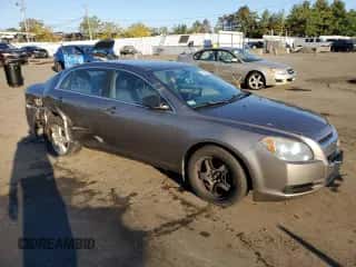 2012 Chevrolet Malibu 1LS с VIN 1G1ZB5E04CF237110, выставлен на аукционе Copart как лот 85343385 с пробегом 159 026 миль миль и Списание • Salvage title. История ставок и продаж доступна на DreamBid. Изображение 4.