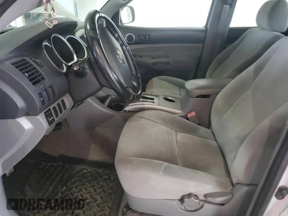2007 Toyota Tacoma PreRunner with VIN 3TMKU72N07M011392, listed as a Copart auction lot 71247805 with 296,959 mi miles and Salvage title. Bid and sale history available at DreamBid. Image 7.