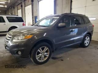 2012 Hyundai Santa Fe SE with VIN 5XYZHDAG0CG120415, listed as a Copart auction lot 82212835 with 175,380 mi miles and Clean title. Bid and sale history available at DreamBid. Image 1.