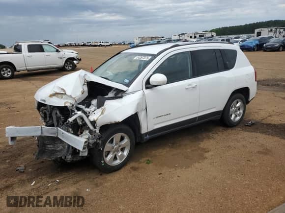 2016 Jeep Compass Latitude with VIN 1C4NJCEBXGD651394, listed as a Copart auction lot 54267375 with 110,113 mi miles and Salvage title. Bid and sale history available at DreamBid. Image 1.