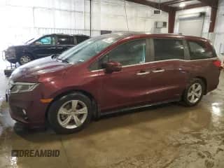 2018 Honda Odyssey EX with VIN 5FNRL6H57JB004552, listed as a Copart auction lot 70447625 with 67,900 mi miles and Salvage title. Bid and sale history available at DreamBid. Image 1.
