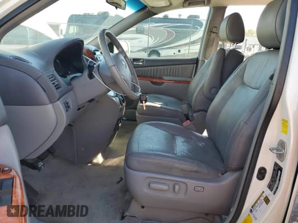 2010 Toyota Sienna XLE с VIN 5TDYK4CC3AS310667, выставлен на аукционе Copart как лот 86077205 с пробегом 184 017 миль миль и Списание • Salvage title. История ставок и продаж доступна на DreamBid. Изображение 7.
