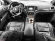 2017 Jeep Grand Cherokee Overland with VIN 1C4RJECG1HC773855, listed as a Copart auction lot 70180755 with 123,525 mi miles and Salvage title. Bid and sale history available at DreamBid. Image 8.