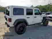 2023 Jeep Wrangler Sport S с VIN 1C4HJXDG5PW502753, выставлен на аукционе Copart как лот 64839795 с пробегом 52 018 миль миль и Чистый • Clean title. История ставок и продаж доступна на DreamBid. Изображение 3.