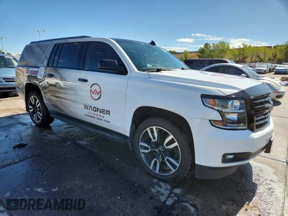 2018 Chevrolet Suburban Premier with VIN 1GNSKJKC5JR353659, listed as a Copart auction lot 80508345 with 77,320 mi miles and Salvage title. Bid and sale history available at DreamBid. Image 4.