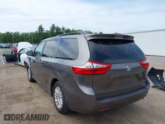 2015 Toyota Sienna XLE with VIN 5TDYK3DC3FS647615, listed as a IAAI auction lot 42587212 with 151,112 mi miles and . Bid and sale history available at DreamBid. Image 3.