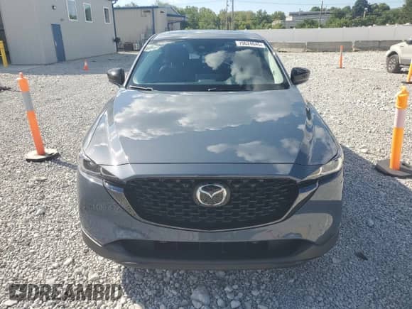 2023 Mazda CX-5 S Carbon Edition z VIN JM3KFBCM7P0169757, wystawiony jako Copart lot #70624645 z przebiegiem 31 275 mil mil oraz Szkoda całkowita • Salvage title. Historia ofert i sprzedaży dostępna na DreamBid. Obrazek 5.