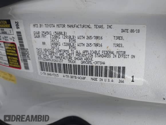 2018 Toyota Tacoma SR5 z VIN 5TFSZ5AN9JX161137, wystawiony jako IAAI lot #42857176 z przebiegiem Nie podano mil oraz . Historia ofert i sprzedaży dostępna na DreamBid. Obrazek 9.