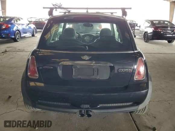 2006 MINI Hardtop S с VIN WMWRE33566TN28003, выставлен на аукционе Copart как лот 66924295 с пробегом 233 085 миль миль и Списание • Salvage title. История ставок и продаж доступна на DreamBid. Изображение 6.