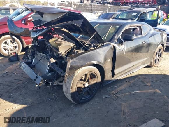 2022 Chevrolet Camaro 1LT z VIN 1G1FB1RX5N0107703, wystawiony jako IAAI lot #41296770 z przebiegiem 33 722 mil mil oraz . Historia ofert i sprzedaży dostępna na DreamBid. Obrazek 2.