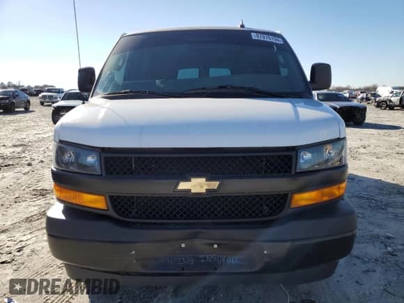 2022 Chevrolet Express Cargo with VIN 1GCWGBFPXN1199808, listed as a Copart auction lot 87076194 with 43,967 mi miles and Salvage title. Bid and sale history available at DreamBid. Image 5.