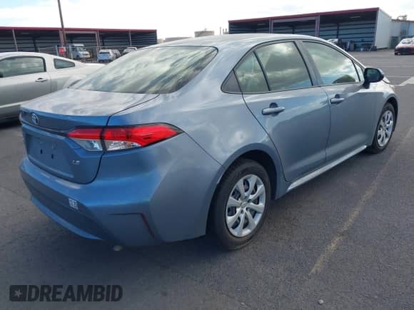 2021 Toyota Corolla LE with VIN JTDEPMAE7MJ147421, listed as a IAAI auction lot 43142290 with Not provided miles and . Bid and sale history available at DreamBid. Image 4.