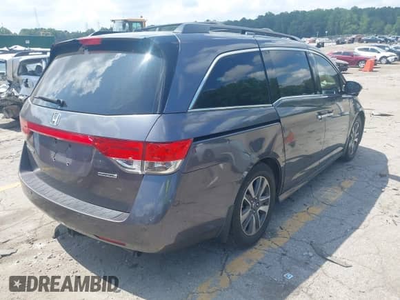 2015 Honda Odyssey Touring Elite с VIN 5FNRL5H98FB099305, выставлен на аукционе IAAI как лот 42880329 с пробегом 203 189 миль миль и . История ставок и продаж доступна на DreamBid. Изображение 4.