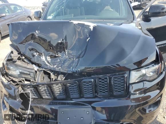 2018 Jeep Grand Cherokee Laredo E with VIN 1C4RJFAG8JC482378, listed as a Copart auction lot 71685435 with 74,430 mi miles and Salvage title. Bid and sale history available at DreamBid. Image 12.