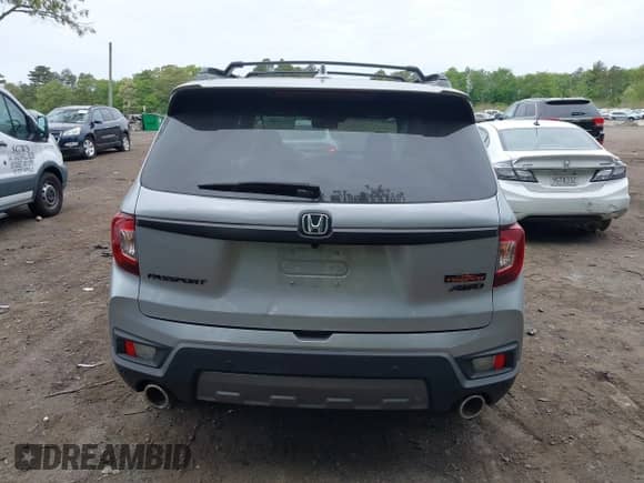 2023 Honda Passport TrailSport z VIN 5FNYF8H66PB024923, wystawiony jako IAAI lot #42243780 z przebiegiem 14 358 mil mil oraz . Historia ofert i sprzedaży dostępna na DreamBid. Obrazek 15.