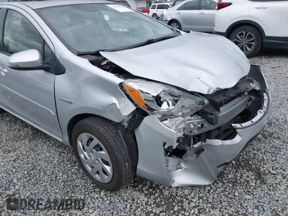 2015 Toyota Prius One z VIN JTDKDTB37F1098842, wystawiony jako IAAI lot #42599025 z przebiegiem 87 264 mil mil oraz . Historia ofert i sprzedaży dostępna na DreamBid. Obrazek 6.