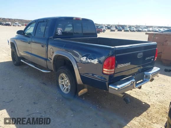 2003 Dodge Dakota SLT с VIN 1D7HG48N23S200916, выставлен на аукционе IAAI как лот 41672271 с пробегом 193 552 миль миль и . История ставок и продаж доступна на DreamBid. Изображение 3.