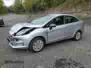 2017 Ford Fiesta S with VIN 3FADP4AJ8HM134295, listed as a Copart auction lot 82036275 with 151,012 mi miles and Salvage title. Bid and sale history available at DreamBid. Image 1.