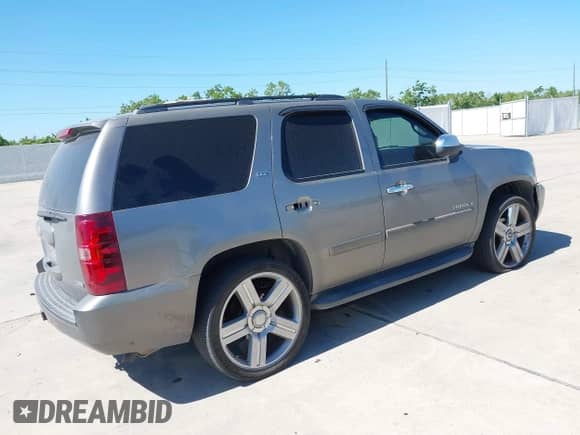 2008 Chevrolet Tahoe 3LT with VIN 1GNFC13018R154833, listed as a IAAI auction lot 42232738 with 243,993 mi miles and . Bid and sale history available at DreamBid. Image 4.