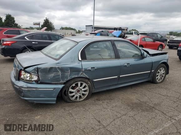 2005 Hyundai Sonata GLS with VIN KMHWF35H65A095122, listed as a Copart auction lot 69081995 with 112,944 mi miles and Salvage title. Bid and sale history available at DreamBid. Image 3.