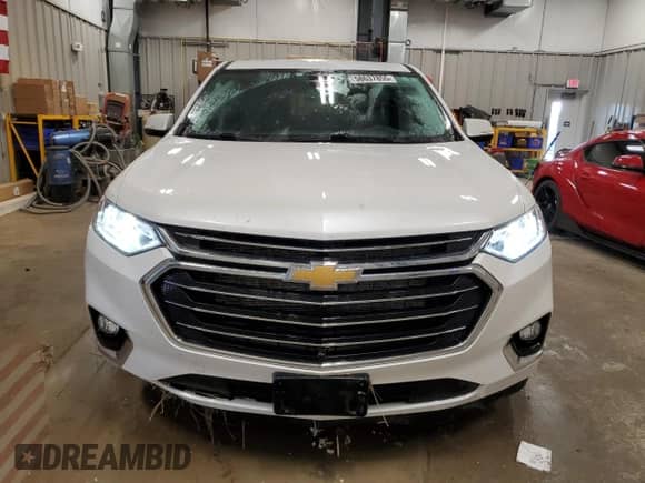 2020 Chevrolet Traverse Premier с VIN 1GNEVKKW2LJ311195, выставлен на аукционе Copart как лот 58637855 с пробегом 112 317 миль миль и Списание • Salvage title. История ставок и продаж доступна на DreamBid. Изображение 5.