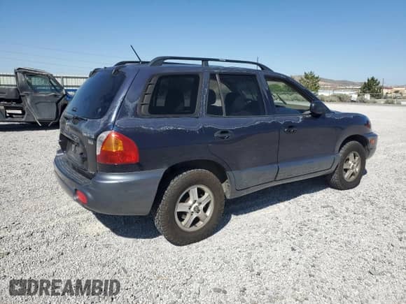 2004 Hyundai Santa Fe GLS z VIN KM8SC73E64U785036, wystawiony jako Copart lot #61242235 z przebiegiem 213 544 mil mil oraz Szkoda całkowita • Salvage title. Historia ofert i sprzedaży dostępna na DreamBid. Obrazek 3.