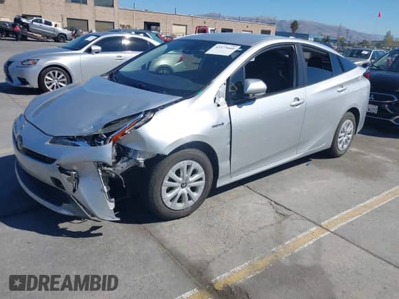 2020 Toyota Prius L Eco with VIN JTDKARFU2L3118901, listed as a IAAI auction lot 43373660 with 147,420 mi miles and . Bid and sale history available at DreamBid. Image 2.