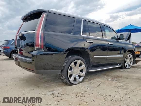 2020 Cadillac Escalade Premium Luxury с VIN 1GYS4CKJ0LR243080, выставлен на аукционе Copart как лот 68518165 с пробегом 88 399 миль миль и Списание • Salvage title. История ставок и продаж доступна на DreamBid. Изображение 3.