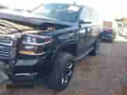 2018 Chevrolet Tahoe Premier with VIN 1GNSKCKC4JR245996, listed as a IAAI auction lot 41195858 with 98,823 mi miles and . Bid and sale history available at DreamBid. Image 2.