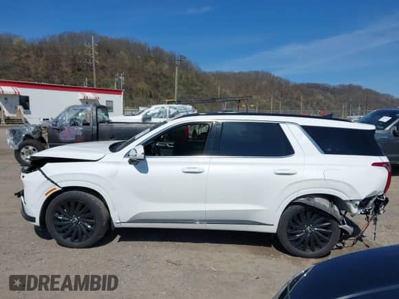 2024 Hyundai Palisade Calligraphy z VIN KM8R7DGE5RU749552, wystawiony jako IAAI lot #41999757 z przebiegiem 14 598 mil mil oraz . Historia ofert i sprzedaży dostępna na DreamBid. Obrazek 14.