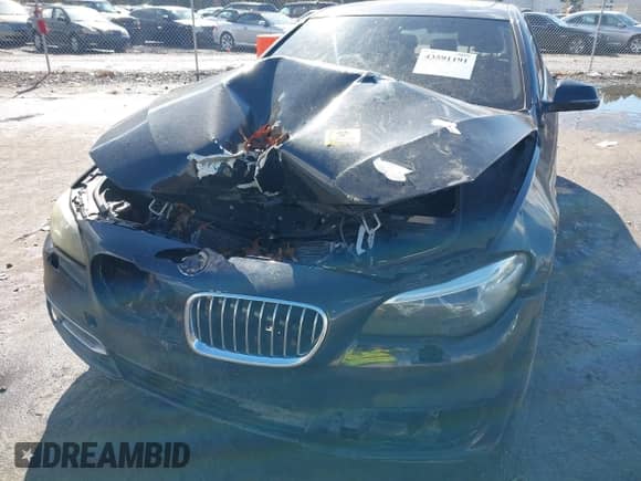 2014 BMW 5 Series 528i with VIN WBA5A5C57ED508695, listed as a IAAI auction lot 43591191 with Not provided miles and . Bid and sale history available at DreamBid. Image 6.