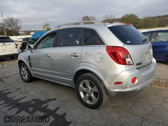 2014 Chevrolet Captiva Sport LT z VIN 3GNAL3EK8ES645994, wystawiony jako Copart lot #79855134 z przebiegiem 114 309 mil mil oraz Szkoda całkowita • Salvage title. Historia ofert i sprzedaży dostępna na DreamBid. Obrazek 2.