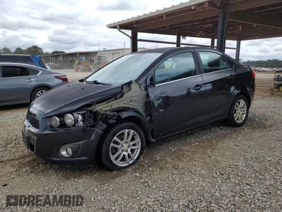 2015 Chevrolet Sonic LT with VIN 1G1JD5SH5F4156716, listed as a Copart auction lot 68521285 with 135,574 mi miles and Salvage title. Bid and sale history available at DreamBid. Image 1.