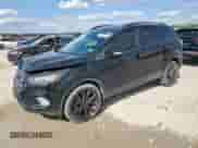 2017 Ford Escape Titanium z VIN 1FMCU0J98HUF06898, wystawiony jako Copart lot #84376745 z przebiegiem 111 161 mil mil oraz Szkoda całkowita • Salvage title. Historia ofert i sprzedaży dostępna na DreamBid. Obrazek 1.