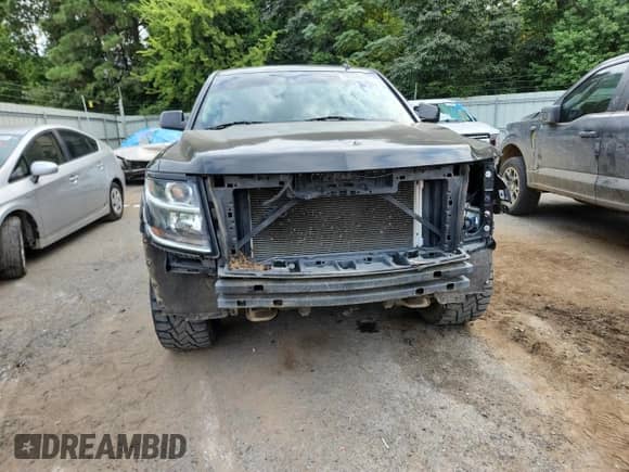 2015 Chevrolet Tahoe LT with VIN 1GNSKBKC5FR257835, listed as a Copart auction lot 70369665 with 157,427 mi miles and Salvage title. Bid and sale history available at DreamBid. Image 5.