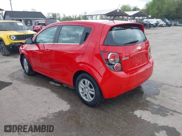 2012 Chevrolet Sonic LT with VIN 1G1JC6SB1C4226485, listed as a IAAI auction lot 42022970 with 105,582 mi miles and . Bid and sale history available at DreamBid. Image 3.