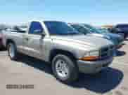 2002 Dodge Dakota z VIN 1B7FL16X72S642881, wystawiony jako IAAI lot #42153560 z przebiegiem 220 917 mil mil oraz . Historia ofert i sprzedaży dostępna na DreamBid. Obrazek 1.