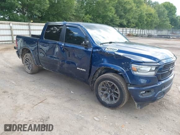 2020 Ram 1500 Laramie z VIN 1C6SRFJT4LN307504, wystawiony jako IAAI lot #42882754 z przebiegiem 100 563 mil mil oraz . Historia ofert i sprzedaży dostępna na DreamBid. Obrazek 1.