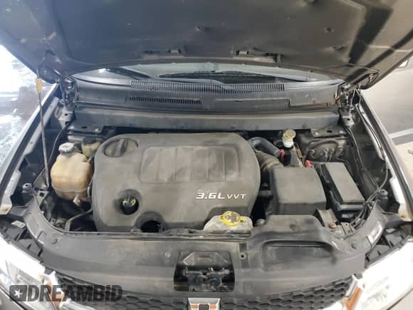 2013 Dodge Journey SXT z VIN 3C4PDDBG2DT665799, wystawiony jako Copart lot #81161765 z przebiegiem 130 438 mil mil oraz Czysty tytuł • Clean title. Historia ofert i sprzedaży dostępna na DreamBid. Obrazek 12.