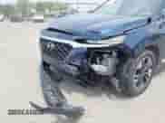 2020 Hyundai Santa Fe SEL with VIN 5NMS3CAA7LH296888, listed as a IAAI auction lot 42442612 with 71,216 mi miles and . Bid and sale history available at DreamBid. Image 6.