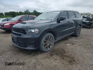 2018 Dodge Durango R/T with VIN 1C4SDJCT8JC327948, listed as a Copart auction lot 65422195 with 104,555 mi miles and Salvage title. Bid and sale history available at DreamBid. Image 1.