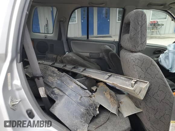 2003 Chevrolet Tracker LT с VIN 2CNBJ634336914564, выставлен на аукционе Copart как лот 52781805 с пробегом 166 575 миль миль и Списание • Salvage title. История ставок и продаж доступна на DreamBid. Изображение 12.
